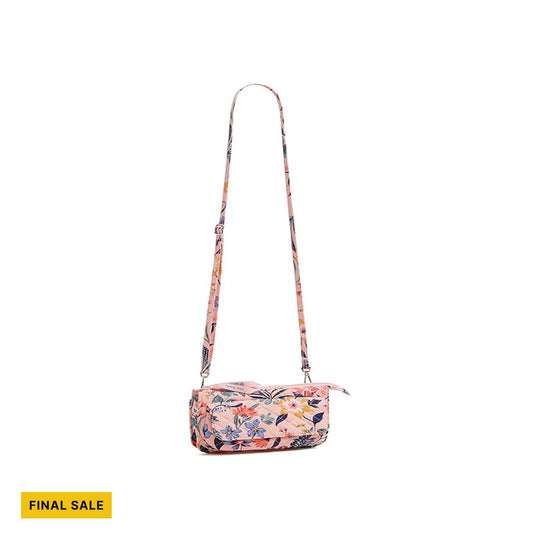 Small quilted floral crossbody wallet with a long adjustable strap