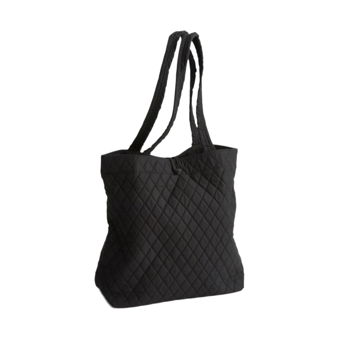 Black quilted tote bag with long shoulder straps