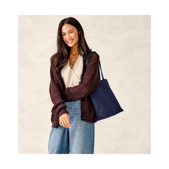 Navy quilted tote bag with shoulder straps