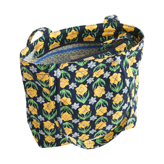 Floral quilted zip tote bag with navy background, dual handles, and an open top compartment