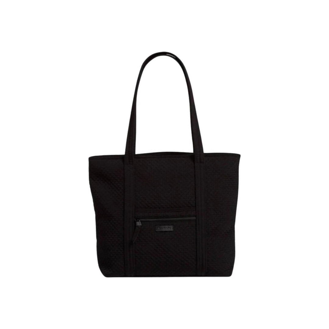 Black quilted tote bag with long shoulder straps and a front zip pocket