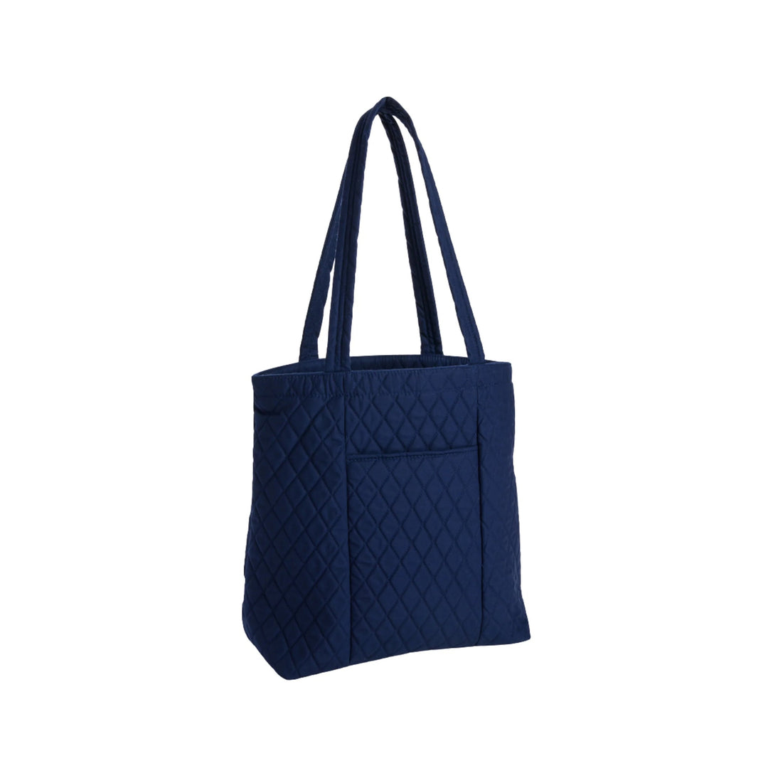 Navy quilted tote bag with long shoulder straps and a front pocket