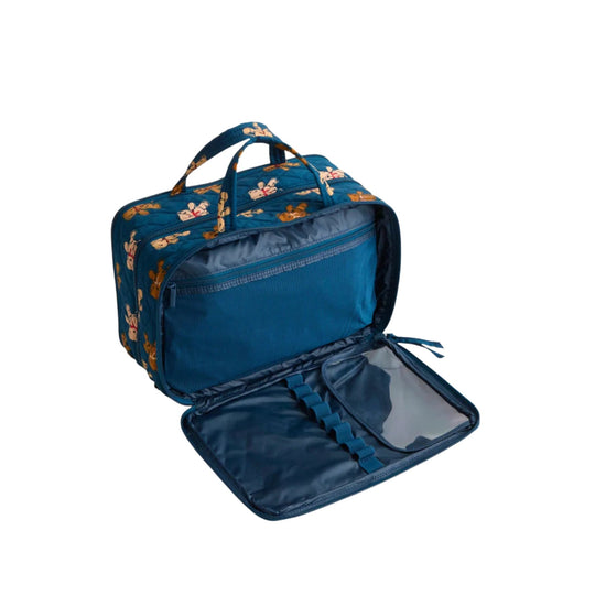 Blue soft-sided zippered travel case with bear print, open to reveal interior pockets