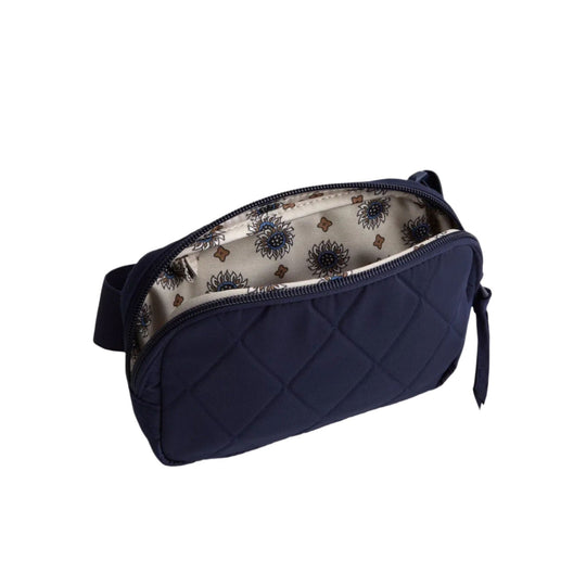 Navy quilted zip pouch with floral patterned lining