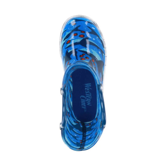 Blue translucent kids rain boot with abstract wave pattern and red dot details, top-down view
