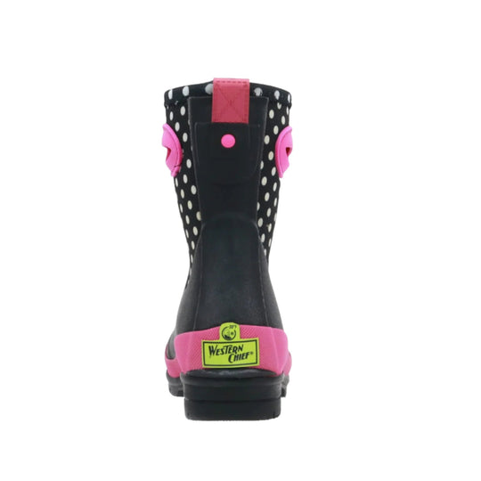 Black children’s rain boot with white polka dots, pink trim, and a Western Chief heel patch, shown from the back