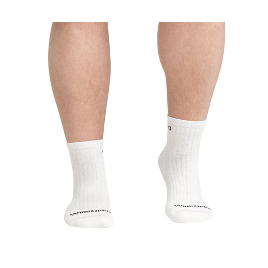 White ribbed quarter socks on lower legs, shown front and side views, with small black logo near the toes