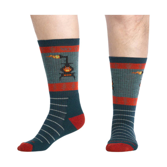 Pair of dark teal crew socks with red stripes, gray toe stripes, and orange fire stove graphics.