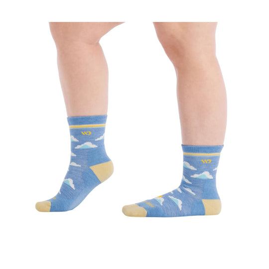 Blue crew socks with cloud pattern, yellow toe and heel, shown on lower legs from side and front.