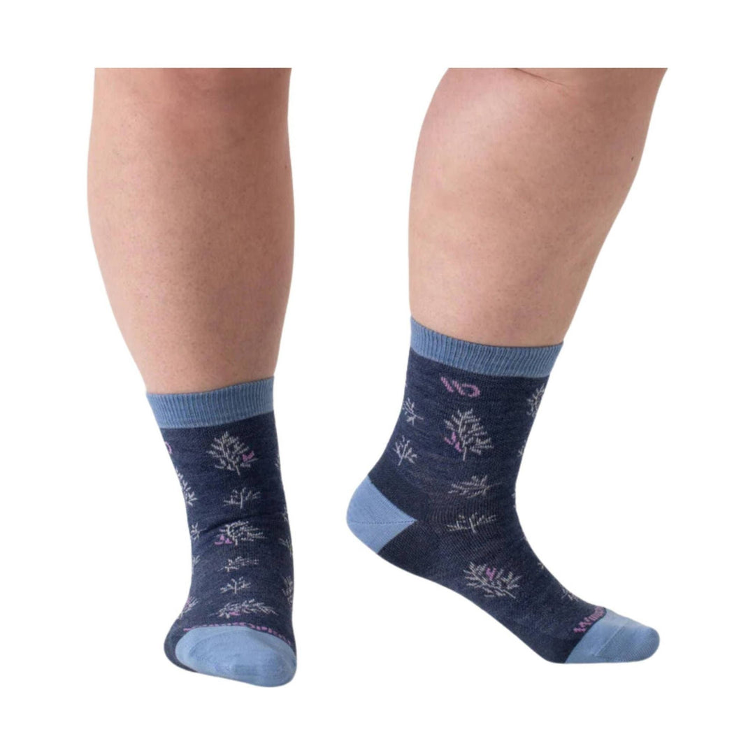 Navy ankle socks with light blue cuffs, heels, and toes, featuring a small floral pattern