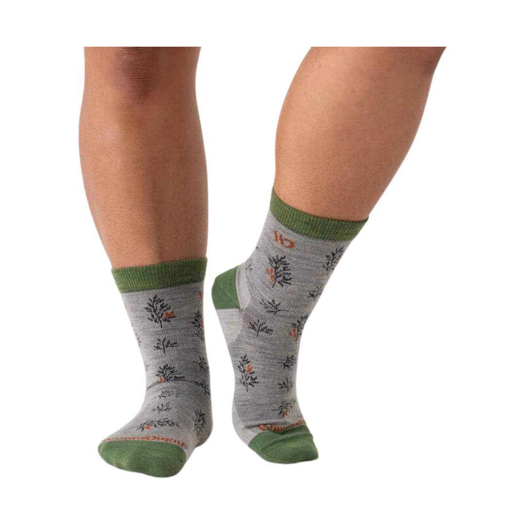 Light gray ankle socks with green cuffs, heels, and toes, shown on a model's legs