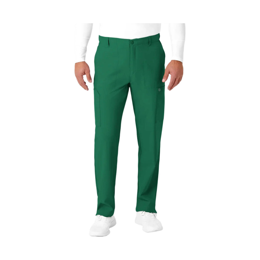 Green straight-leg scrub pants with cargo pockets and a button waist, shown on a model with a white shirt and white shoes