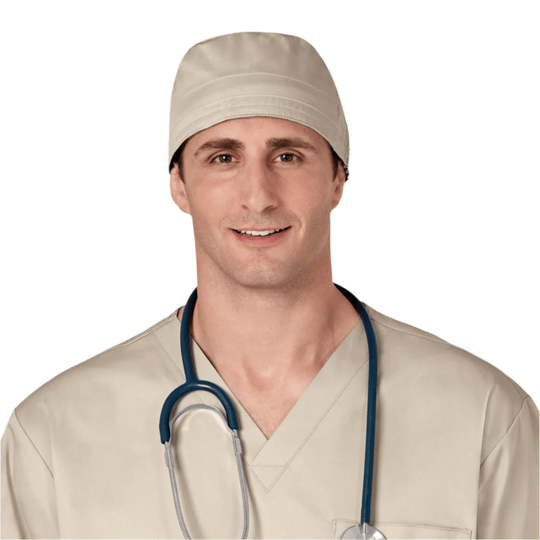 Beige scrub cap worn with matching medical scrubs and a stethoscope