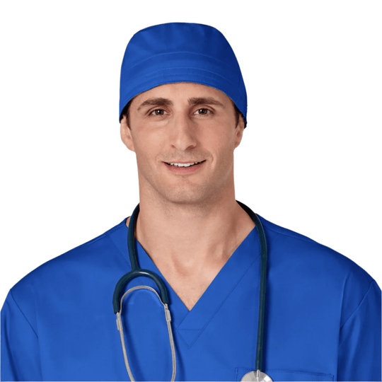 Blue scrub cap and matching blue medical scrubs with a stethoscope, front view on a white background