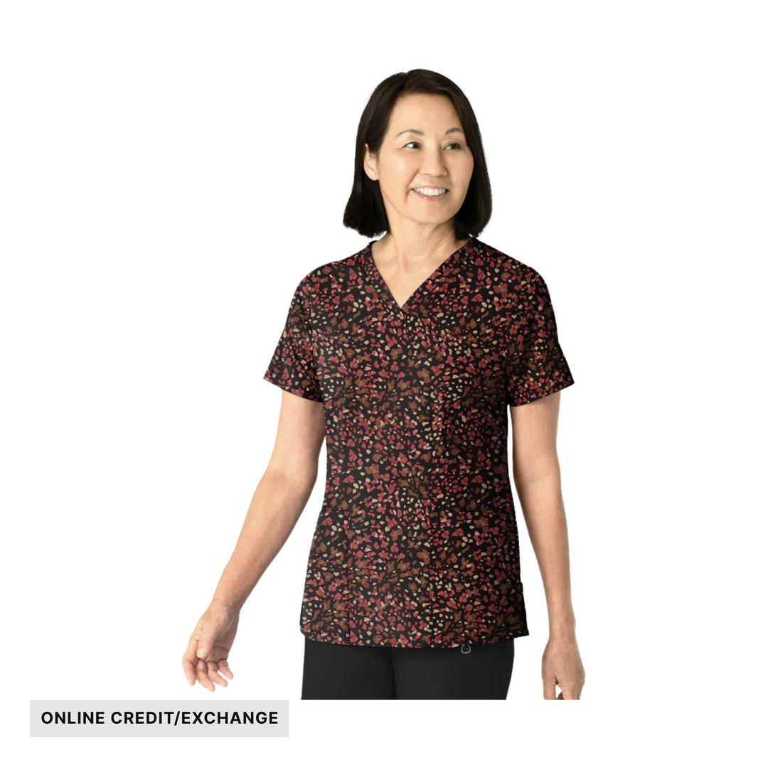 Short-sleeve black V-neck scrub top with a pink and tan abstract print