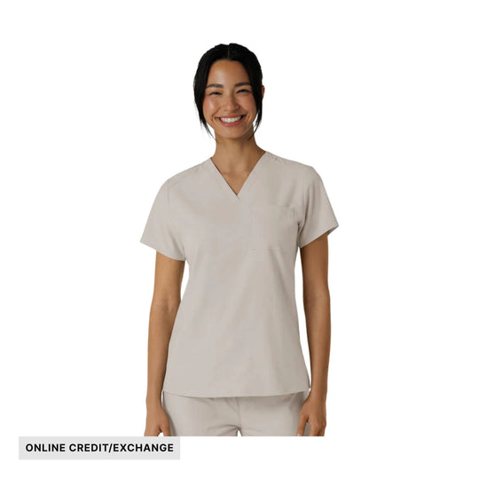 Light gray V-neck scrub top on a model with short sleeves and a chest pocket