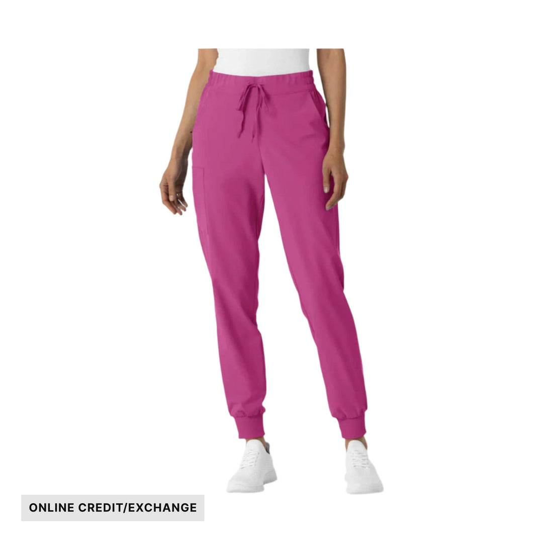 Pink jogger scrub pants with drawstring waist and ankle cuffs, with "ONLINE CREDIT/EXCHANGE" text