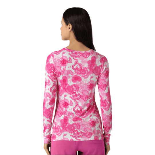 Pink and white heart-pattern long-sleeve scrub tee, back view