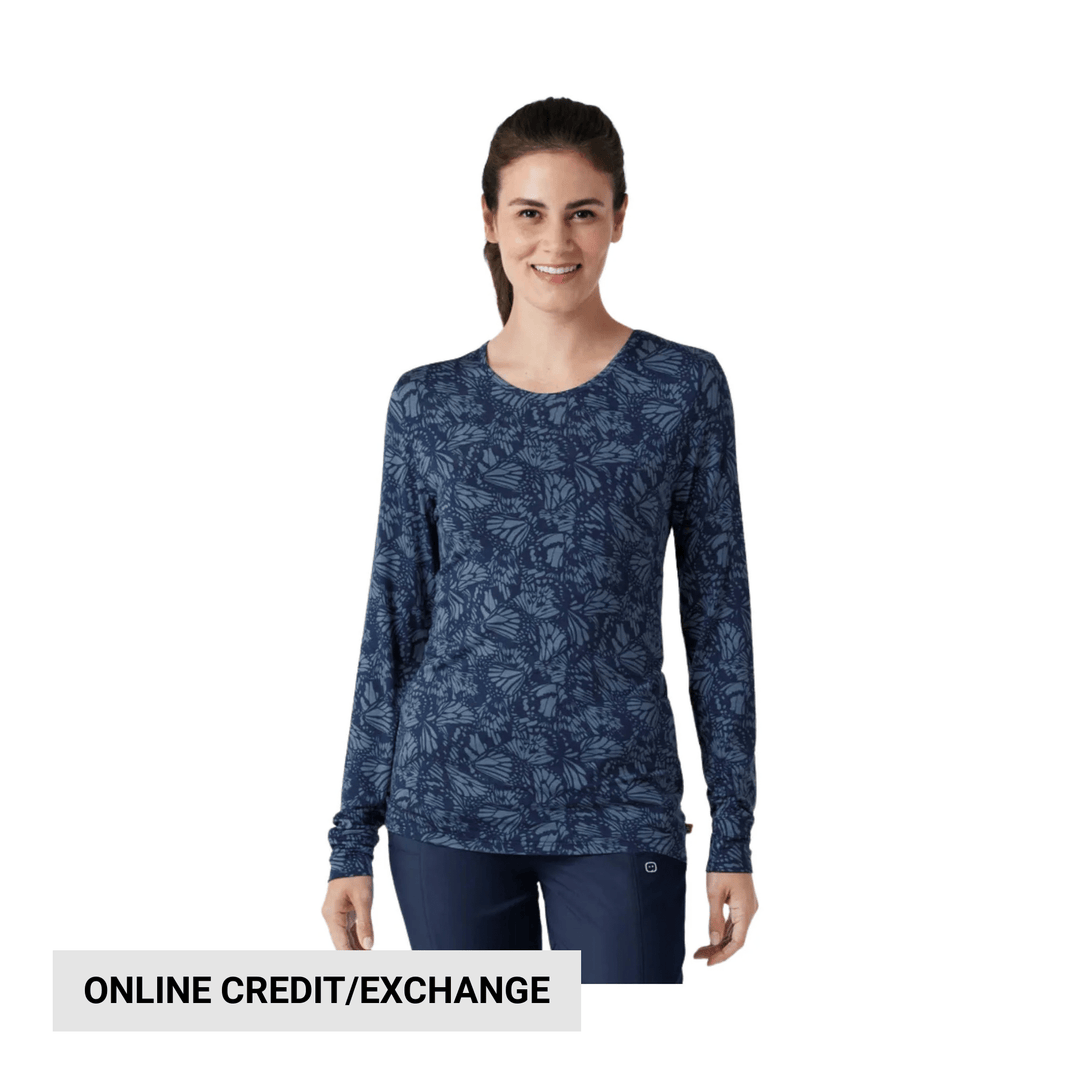 Navy long-sleeve floral print athletic top on a model, with "ONLINE CREDIT/EXCHANGE" text overlay