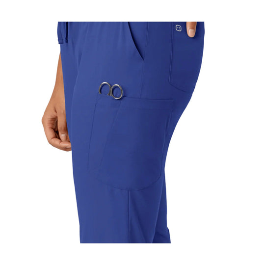 Blue jogger scrub pants with side cargo pocket and metal ring detail