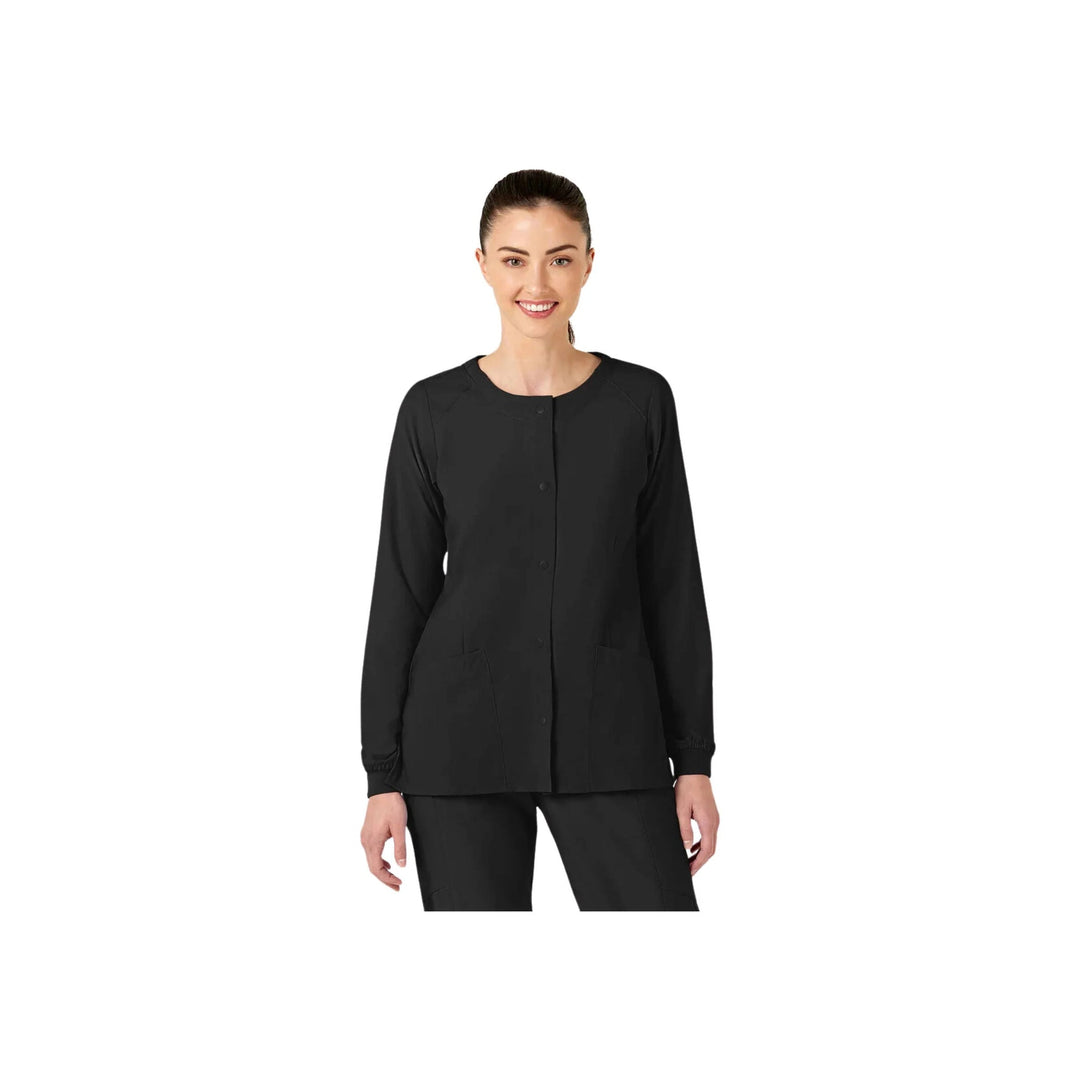 Black button-front scrub jacket with long sleeves and front pockets, worn on a model