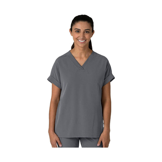Gray scrub top with V-neck and short rolled sleeves on a model