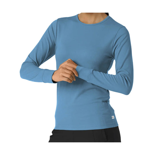 Blue long-sleeve crewneck shirt with a fitted silhouette