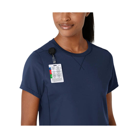 Navy crew neck T-shirt with short sleeves and a clipped product tag