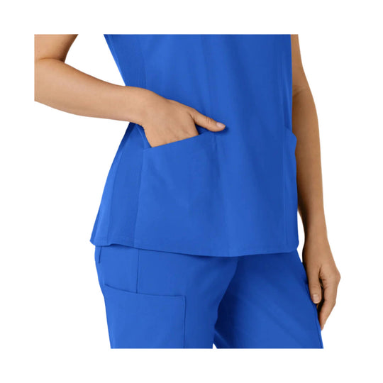 Royal blue scrub top with side pocket and matching pants, shown cropped at the torso
