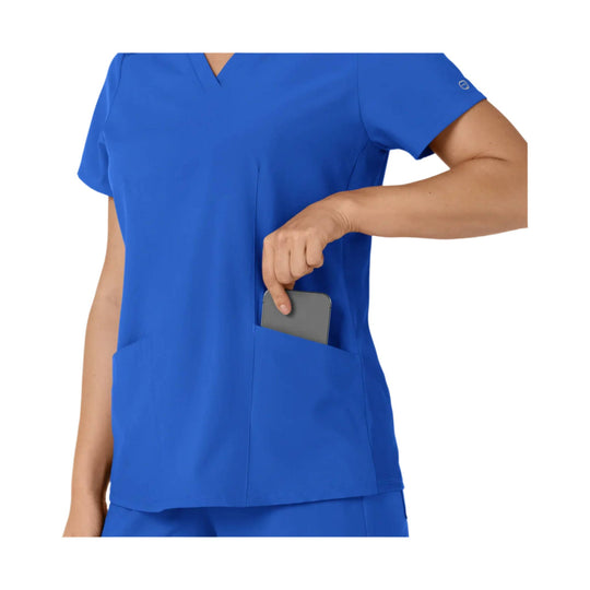 Royal blue V-neck scrub top with front pockets, shown with a phone in the chest pocket