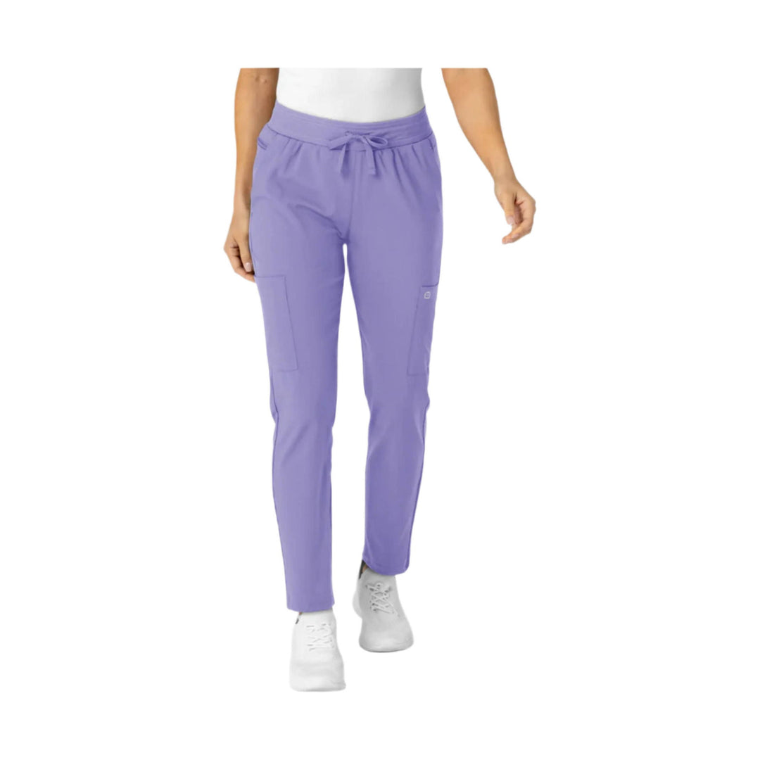 Lavender high-rise scrub pants with a drawstring waist and tapered legs, shown with cargo pockets.