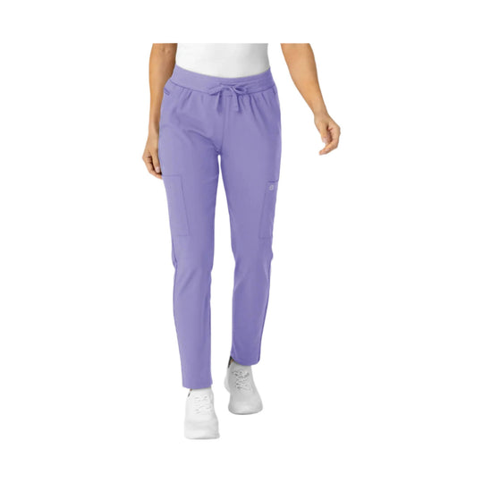 Lavender high-rise scrub pants with a drawstring waist and tapered legs, shown with cargo pockets.