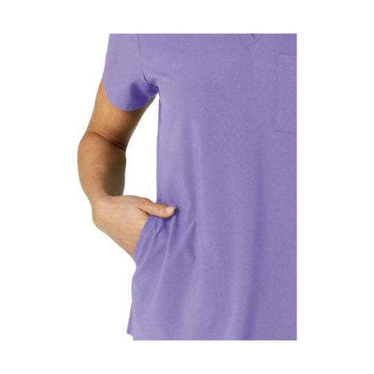Lavender V-neck scrub top with chest pocket and side pocket, shown cropped at the torso