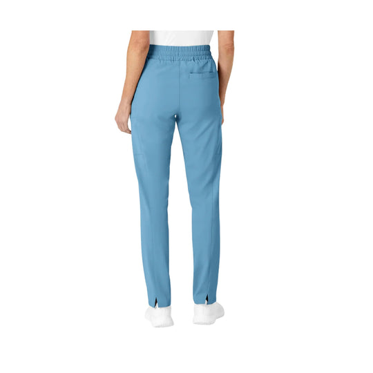 Light blue slim-leg scrub pants shown from the back
