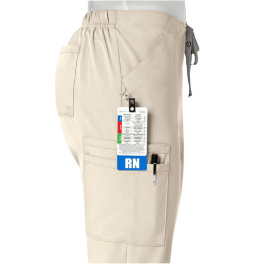Khaki women’s scrub pants with an elastic waistband, cargo pockets, and an RN tag
