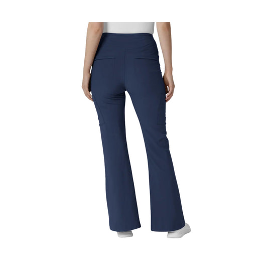 Navy flared scrub pants shown from the back with cargo pockets