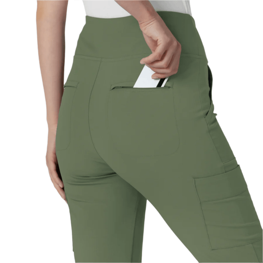 Olive green high-waisted cargo scrub pants with back patch pockets and a side cargo pocket
