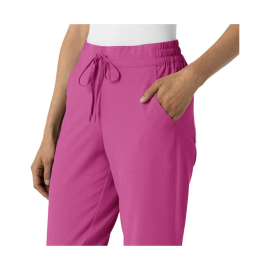 Pink jogger scrub pants with drawstring waist and side pockets