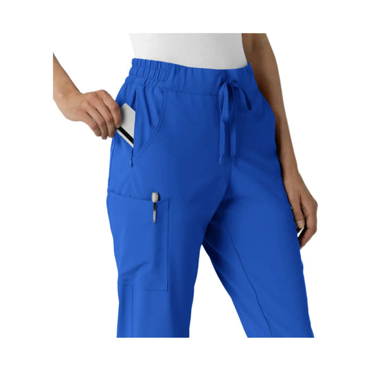 Blue scrub pants with elastic waist, drawstring, and cargo pocket