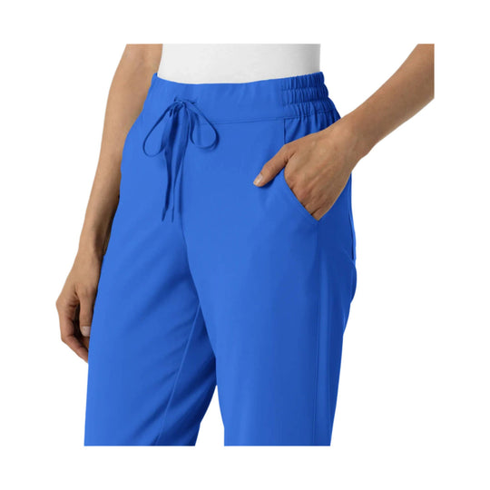 Blue jogger scrub pants with elastic waistband, drawstring tie, and side pockets