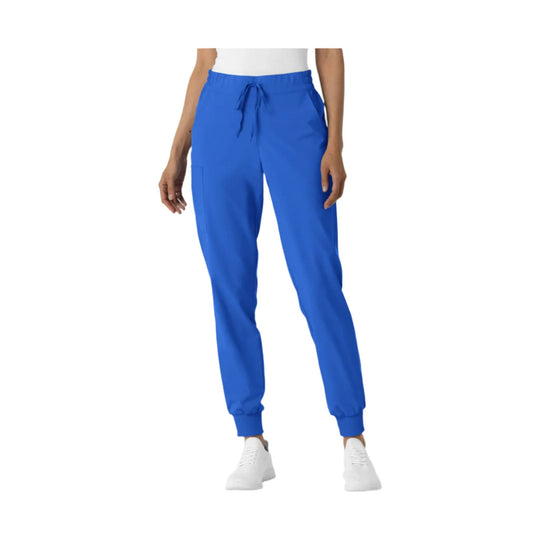 Blue jogger scrub pants with elastic waistband, drawstring, tapered legs, and ribbed cuffs