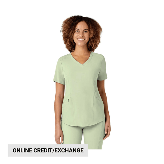 Light green V-neck scrub top with short sleeves and front pockets, shown on a model