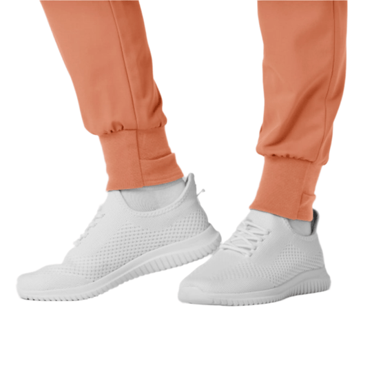 White knit sneakers with terracotta jogger cuffs