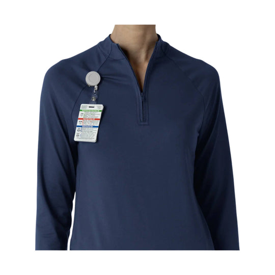 Navy quarter-zip pullover with long sleeves and a clipped product tag on the chest