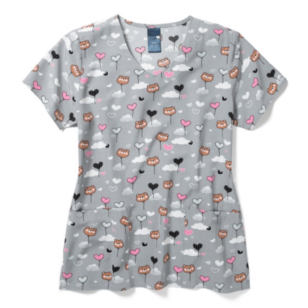 Gray V-neck scrub top with short sleeves and a pink, white, and black heart-and-cloud print