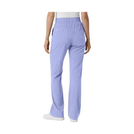 Light lavender bootcut scrub pants shown from the back