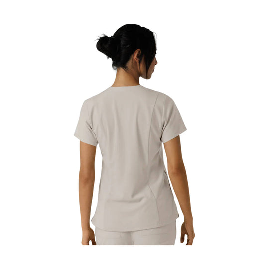 Light gray short-sleeve V-neck scrub top shown from the back on a model