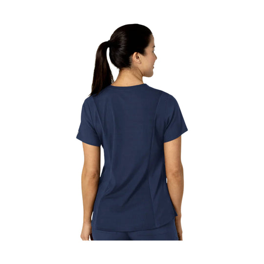 Navy short-sleeve scrub top shown from the back