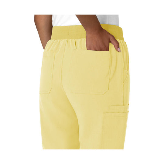 Pale yellow jogger scrub pants with elastic waistband and large patch pockets