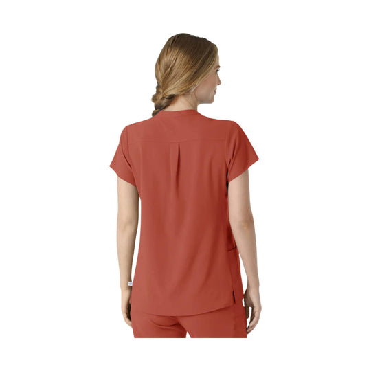 Coral short-sleeve scrub top shown from the back